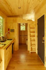 The Isidore cabin has a sleeping loft with a clerestory window.