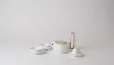 Researching tea rituals, Luca Nichetto noticed that tea in Russia is served in handleless bowls, which inspired the shape of the vessels.