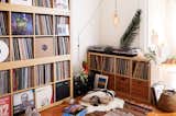 Living Room Bret is an avid record collector, and his collection fills a corner of the space.  Photo 7 of 7 in 500 Square Feet Is Just Right in Greenpoint