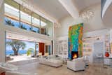 Located in the Hope Ranch neighborhood of Santa Barbara, California, this striking home sits on an almost four-acre bluff with over 200 feet of ocean contact. The art-adorned fireplace acts as the centerpiece of the living room that opens up to unobstructed views of the Pacific Ocean. &nbsp;