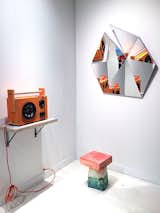 Stonefox Architect’s mirror series includes five different faceted shapes in five high-gloss colors. Each mirror started with flat pieces that were fit together like a puzzle. Standing below the mirror, is Kueng Caputo’s Sand Chair, formed out of Styrofoam, mortar, sand, and bright-colored pigment pastes. Also shown here is Tom Sachs's Mythologies, a mixed media art piece that mimics a speaker—and actually works.  Photo 7 of 13 in Must-See Discoveries from San Francisco’s Design + Art Fair