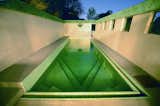 Along with being designated as a Los Angeles Historic-Cultural Monument in 1974, it was acquired by actress Diane Keaton who worked with Josh Schweitzer to remodel the house. The green hue of the copper patina is mirrored in the tile that lines the pool. &nbsp;&nbsp;