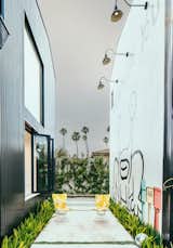 While exploring its extensive outdoor art collection, you’ll find a 25-foot, two-story mural that was the first residential commission by Parisian street artist, Invader.  Photo 14 of 18 in Meet Us in Los Angeles for Our Biggest Home Tour Yet