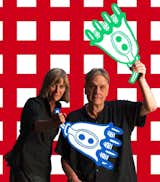 Nathalie Du Pasquier and George Sowden are shown here holding a pair of wacky props that imitate a motif that can be found in the textiles.  Photo 3 of 8 in Q&A With the Design Duo Behind a Playful Textile Collection