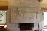 At Frank Lloyd  Wright's Hollyhock House, he completed the fireplace, a skylight above, and a moat that was designed to hold a pool of water. 