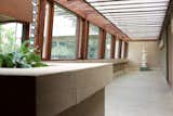 The hallway at Frank Lloyd Wright's Hollyhock House in Los Angeles is lined with custom-made art glass.