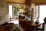 The living room at Frank Lloyd Wright's Hollyhock House in Los Angeles. The Japanese screen is a reproduction of the original. 
