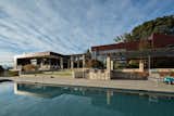 Shown here is the 85-foot-long infinity-edge pool and the outdoor terraces that take advantage of the temperate climate. This setup reveals how important an indoor/outdoor lifestyle is to the residences of this region. The landscape was outfitted by Jack Chandler Landscape Design.&nbsp;