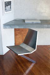 Throughout the house, we were shown a number of Lautner-designed details. Working with Goldstein, the architect was given the opportunity to design custom furniture pieces, which is something he didn’t normally get the chance to do. His angular, minimalist style was carried throughout—as shown here on a custom swivel desk chair that rotates directly from the floor of the bedroom.