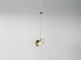 Workstead Orbit Hanging Pendant with a double disc. Photo courtesy of Workstead  Photo 3 of 4 in Lighting by Nick Stutts