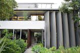 As seen today, the front facade of Neutra's VDL Studio and Residences in Silver Lake stands proud with a composition of clean lines, sharp angles, and reflective surfaces. The large amount of glass allows you to see directly through the house—further accentuating its relationship to the outdoors. Additionally, the automatic sun louvers that he designed allows the house to adapt ot varying temperatures and levels of sun exposure.