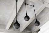 As the duo’s first dive into lighting design, each pendant was spun by hand in L.A. and has a custom perforated pattern that allows light to shine through.