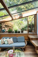 One of the additions that took place during Brinkworth’s second phase of extensions, is the glazed garden room, which sits half a level below the first floor. Handcrafted wooden steps lead you to a terraced garden.