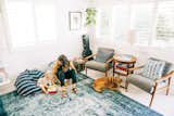Grant Ellis’s wife Julie and daughter Kaia are shown here in their cozy, indigo-filled living room in Cardiff, California.&nbsp;