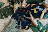 They produce little denim vests for kids that are handmade with a traditional embroidery process in Zinacantán in Chiapas, México.