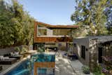 Outdoor, Trees, Large Pools, Tubs, Shower, Back Yard, Garden, and Concrete Patio, Porch, Deck  Photos