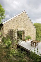Transformation of an old barn into dwelling with external terrace. Martiat+Durnez Architectes   Photo 18 of 43 in Modern Rustic by Gessato