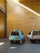 the client envisioned a versatile shell where he could work on his collection of old step-vans and ’70s electric cars, shown here. 

 #interior #interiorarchitecture #sanfrancisco #workshop #interstice #intersticearchitects #cesarrubio #cesarrubiophotography