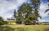 Preserving these majestic trees and pristine coast became a departure point for the siting strategy and formal language of the house and landscape. The main house is clad in the local Douglas fir with deep protective eaves. In contrast, the elevated guest house in mineral in nature poetically connected to the land. 

#beachhouse #nature #trees #douglasfir #siting #preservation #landscape #residentialarchitecture #residential #interstice #intersticearchitects #comox #britishcolumbia #vancouverislands #bradlaughton #bradlaughtonphotography 