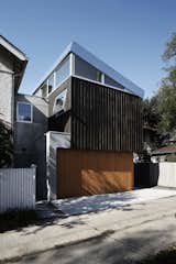 #GamblinOstrow #modern #lighting #windows #naturallight #wood #panels #concrete #exterior #outside #landscape #driveway #angles #dynamic #fence #Minnesota #KingsleyStephensonArchitecture