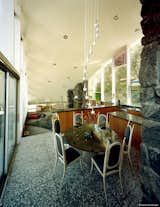 #GarciaHouse #modern #midcentury #hillside #1962 #JohnLautner #geometry #interior #inside #levels #dining #furniture #stone #seating #table #lighting #windows #dynamic #LosAngeles #MarmolRadziner
