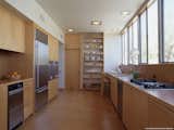 #KaufmannHouse #modern #midcentury #Nuetra #1946 #restoration #archival #original #details #lighting #interior #inside #wood #kitchen #appliances #stove #shelves #PalmSprings #California #MarmolRadziner 