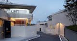 #SeongbukdongResidence #modern #midcentury #enclave #sustainable #L-shaped #exterior #outside #outdoors #structure #street #lighting #geometry #garage #driveway #Seoul #JoelSandersArchitects