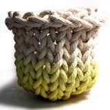 Rope basket by artisan Tanya Aguiñiga, who created this piece by dip-dying hand-knit cotton rope in a vat of chartreuse. Handmade in her LA studio. 