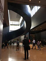A monumental steel stair connects the ground level to the lower levels of the National Museum of African American History and Culture in Washington DC. It boasts no structural supports, weighs 80,000 lbs, and was fabricated by SteelFab, which won an award from the Washington Building Congress for the work. 