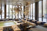 Featuring a bubbling water feature punctuated with seasonal trees, the International Style–designed Pool Room was home to many a power lunch over the years.
