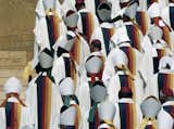 For World Youth Day in Paris, July 2007, Jean-Charles de Castelbajac designed the liturgical vestments for Pope John Paul II and 5500 members of the clergy, with robes featuring a spectrum of rainbow colors.
