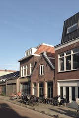 Renovating and rebuilding a home is no small feat—but it's especially tough in Amsterdam, where zoning laws and loyalty to the local vernacular run deep. Updating a crumbling structure in the city's Oud-West neighborhood ("Big Idea: New Kid on the Block," Sept. 2016), the Jeffries family struck a balance between modern and traditional. Here, a look at the preexisting facade, at center.