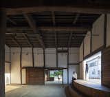 Activating the warehouse into a venue, a new stage was added to the interior to host performances and meetings.