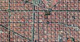 Clusters of housing with communal courtyards are placed along a strict grid pattern in Barcelona's Eixample district, shown here. Reprinted with permission from Overview by Benjamin Grant, copyright (c) 2016. Published by Amphoto Books, a division of Penguin Random House, Inc.
Images (c) 2016 by DigitalGlobe, Inc.