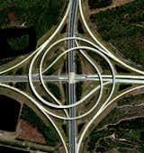 A view of two swirling highways in Jacksonville, Florida. Reprinted with permission from Overview by Benjamin Grant, copyright (c) 2016. Published by Amphoto Books, a division of Penguin Random House, Inc. 

Images (c) 2016 by DigitalGlobe, Inc.
