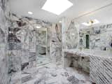 Mixed marble bathroom in New City, NY, from Sotheby's International Realty