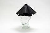 The Leather Umbrella Hat by Yield Design promises to be your shelter in the storm. A hands-free rain solution made 100 percent from leather: What could go wrong?  Photo 2 of 7 in A New Design Exhibition Solves Problems You Didn't Know You Had