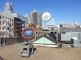 On the roof of the building, optical devices by Korean technology company Sunportal track the sun throughout the day.  