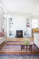 This bright and airy West Village duplex was renovated by Fogarty Finger for a family who moved from just three floors below. The apartment had been previously occupied by the same resident for 50 years. A Moroccan theme now runs through the home.

Photo by Howie Guja
Styling by Gorilla Styling  Photo 1 of 6 in West Village Duplex Renovation by Heather Corcoran