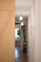 Hallway Once dark and  Photo 7 of 9 in A Barcelona Apartment Gets a Softly Modern Renovation