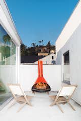 In Los Angeles, a fireplace found at the Rose Bowl Flea Market furnishes a deck belonging to Glee star Jayma Mays and actor Adam Campbell.
#losangeles #fireplace #vintage #deck
  Photo 1 of 3 in Retro Fireplaces by Luke Hopping