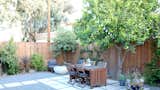 The house was freshly renovated when the residents bought the house in 2013; they redid the backyard themselves. The Bowl fire pit is by Potted.  Photo 7 of 7 in The L.A. Home of Song Exploder’s Hrishikesh Hirway Is Barely Larger 
Than a Music Box