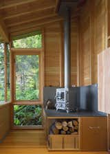 While the space is heavily insulated, with strong solar gain, a cast-iron stove from Salamander Stoves provides extra warmth on cool days.