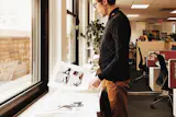 NYC office, Tim Vienckowski, Senior Designer, working on our Nov. 2016 Small Space issue layouts. On newsstands Oct. 11th! 
