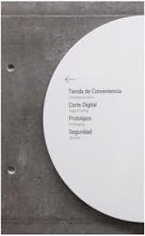 Typography is carefully composed on the simple circular shape and set in the Fakt font.