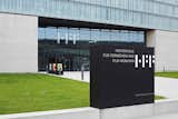 University of Television and Film Munich: To ensure easy orientation, the university’s logo and important information were applied, almost like projections, directly onto the concrete and glass facades for high visibility.  Photo 1 of 49 in Way-Finding Systems by Rob Hewitt