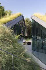 #EdgelandHouse #residence #modern #sunken #pithouse #exterior #dynamic #glass #windows #geometric #outside #outdoors #structure #BercyChenStudio