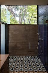 Bath Room, Open Shower, Ceramic Tile Floor, Ceramic Tile Wall, and Concrete Wall  Photos from Tetra House