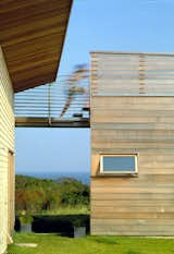 #AcquinnahHouse #modern #structure #concrete #cedar #fir #stainlesssteel #exterior #outside #outdoors #landscape #view #windows #naturallight #deck #Martha'sVineyard #1998 #AndrewFlake #CharlesRoseArchitects  Photo 3 of 5 in Aquinnah House by Charles Rose Architects