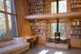 #LakeHouse #modern #structure #residence #interior #inside #indoors #seating #fireplace #bookshelves #storage #windows #naturallight #woodburning #ChristopherCampbellArchitecture